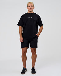 Man wearing Deadly Runners Run Club FLXCotton Oversize Tee - Black | Model:Jaiden | Size:M | Thumbnail Index: 11