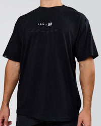 Man wearing Deadly Runners Run Club FLXCotton Oversize Tee - Black | Model:Jaiden | Size:M | Thumbnail Index: 14