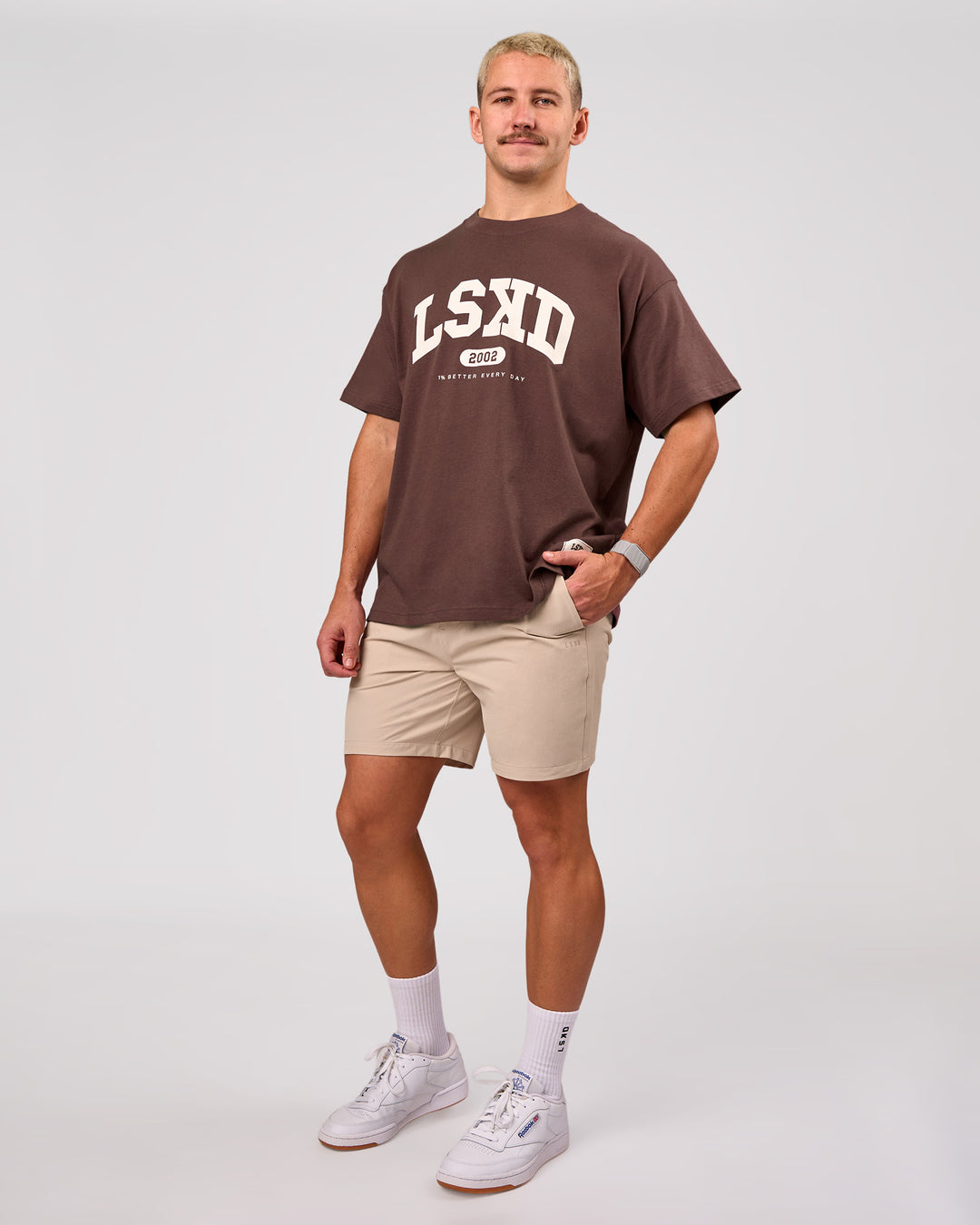 Man wearing Varsity EST Heavyweight Oversized Tee  - Cocoa Powder-Off White | Model:Jaiden | Size:M - view 6