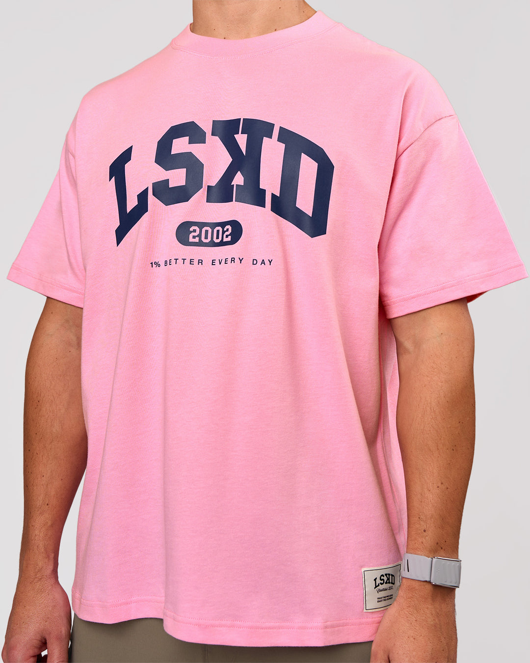 Man wearing Varsity EST Heavyweight Oversized Tee  - Pink Rose-Future Navy | Model:Jaiden | Size:M - view 10