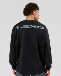 Man wearing Backline Washed Heavyweight Oversized LS Tee - Black Washed | Model:Leandro | Size:M | Thumbnail Index: 0