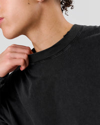 Man wearing Backline Washed Heavyweight Oversized LS Tee - Black Washed | Model:Leandro | Size:M | Thumbnail Index: 4