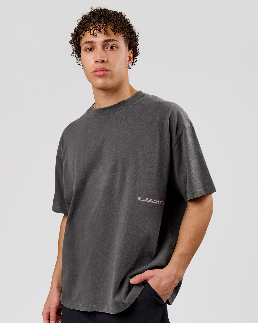 Man wearing Backline Washed Heavyweight Oversized Tee - Asphalt Washed | Model:Leandro | Size:M - view 3