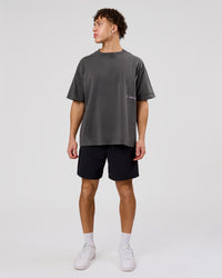 Man wearing Backline Washed Heavyweight Oversized Tee - Asphalt Washed | Model:Leandro | Size:M | Thumbnail Index: 8