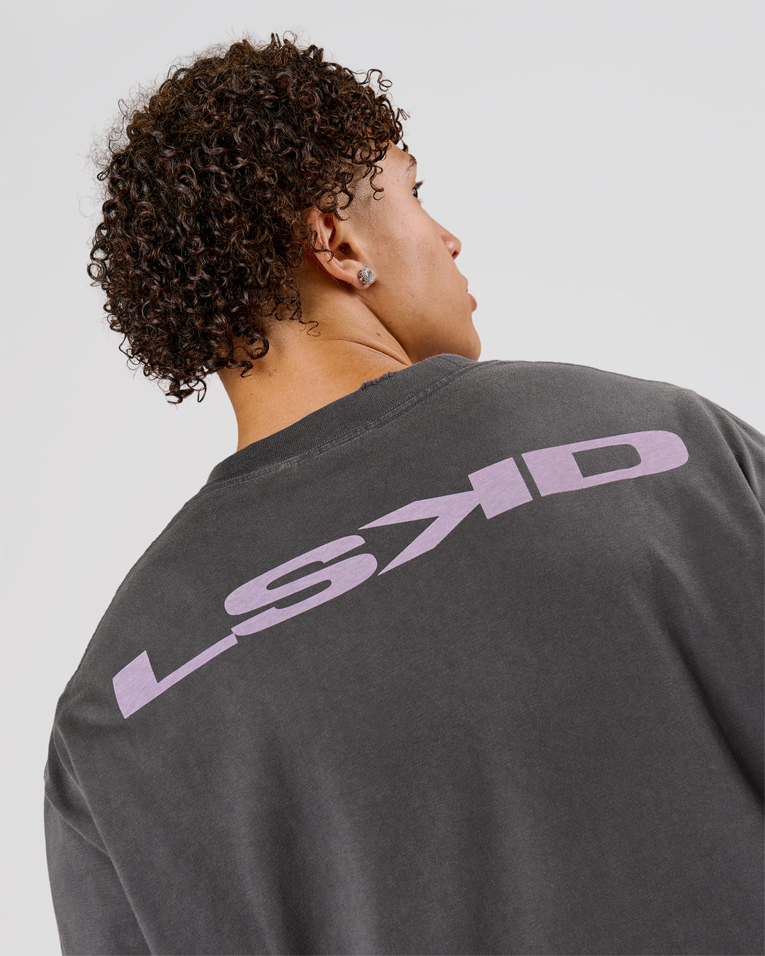 Man wearing Backline Washed Heavyweight Oversized Tee - Asphalt Washed | Model:Leandro | Size:M - view 13