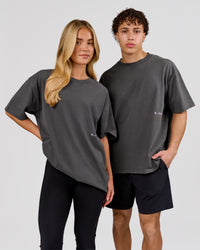 Man wearing Backline Washed Heavyweight Oversized Tee - Asphalt Washed | Model:Leandro | Size:M | Thumbnail Index: 16