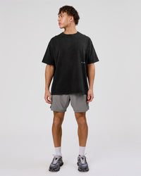 Man wearing Backline Washed Heavyweight Oversized Tee - Black Washed | Model:Leandro | Size:M | Thumbnail Index: 5