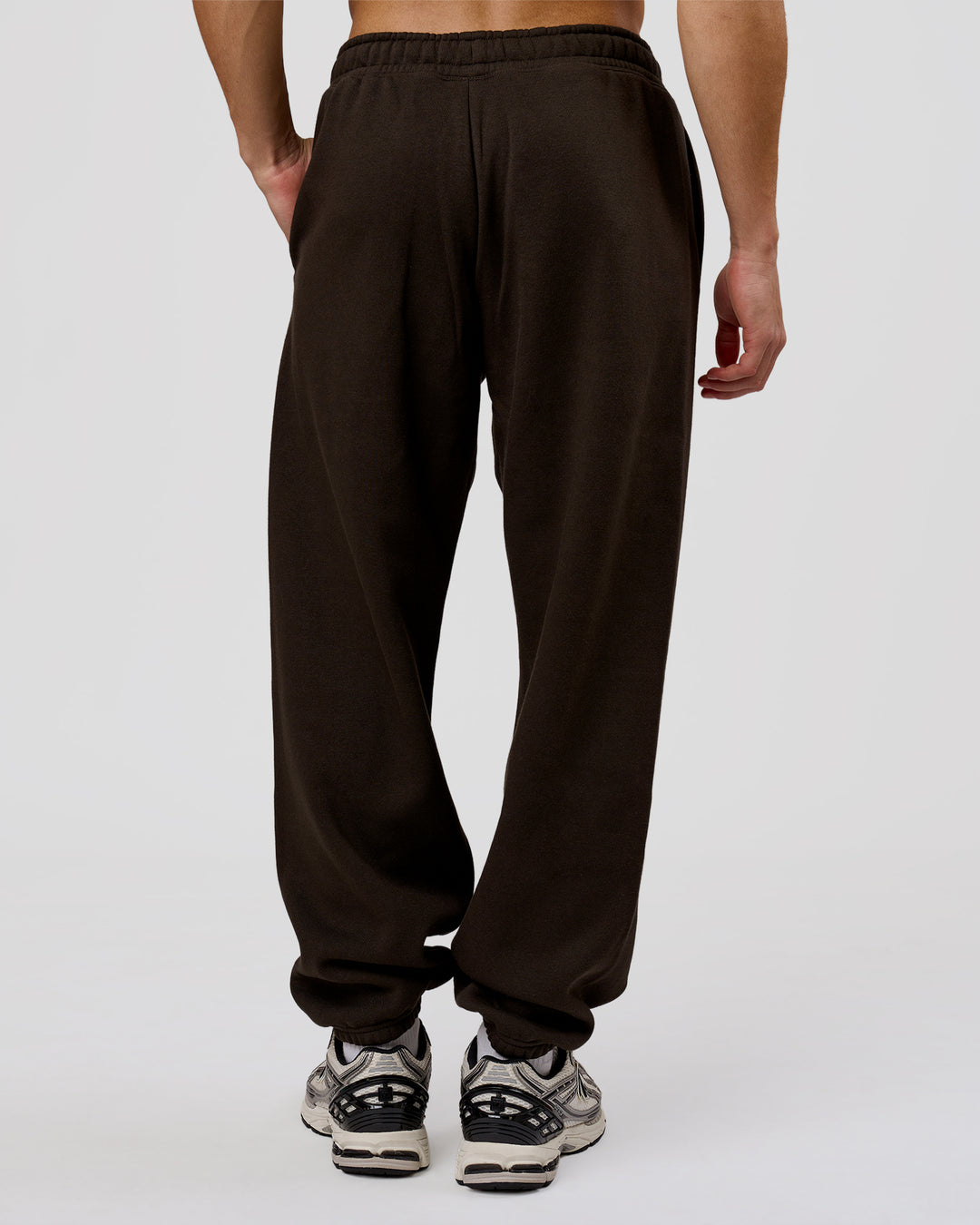 Man wearing Base Baggy Cuffed Track Pant - Ground Coffee | Model:Leandro | Size:M - view 5