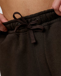 Man wearing Base Baggy Cuffed Track Pant - Ground Coffee | Model:Leandro | Size:M | Thumbnail Index: 6