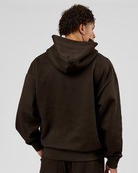 Man wearing Base Oversized Hoodie - Ground Coffee | Model:Leandro | Size:M | Thumbnail Index: 6