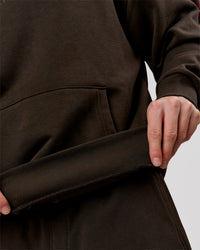 Man wearing Base Oversized Hoodie - Ground Coffee | Model:Leandro | Size:M | Thumbnail Index: 16