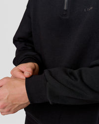 Man wearing Base Quarter Zip Sweater - Black | Model:Leandro | Size:M | Thumbnail Index: 3