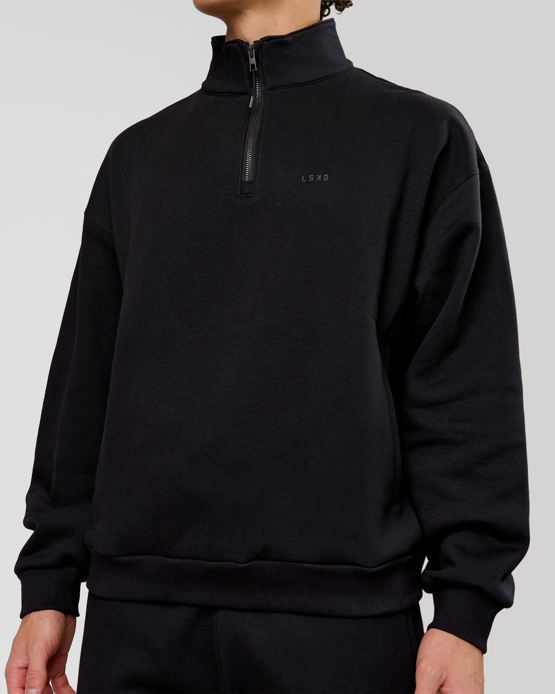 Man wearing Base Quarter Zip Sweater - Black | Model:Leandro | Size:M - view 5