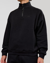 Man wearing Base Quarter Zip Sweater - Black | Model:Leandro | Size:M | Thumbnail Index: 4