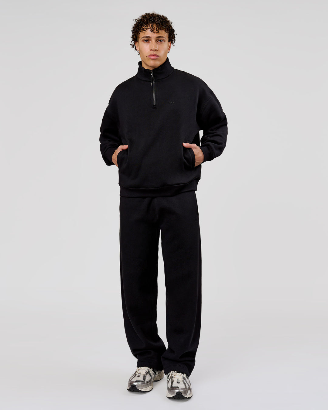 Man wearing Base Quarter Zip Sweater - Black | Model:Leandro | Size:M - view 6