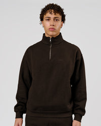 Man wearing Base Quarter Zip Sweater - Ground Coffee | Model:Leandro | Size:M | Thumbnail Index: 0
