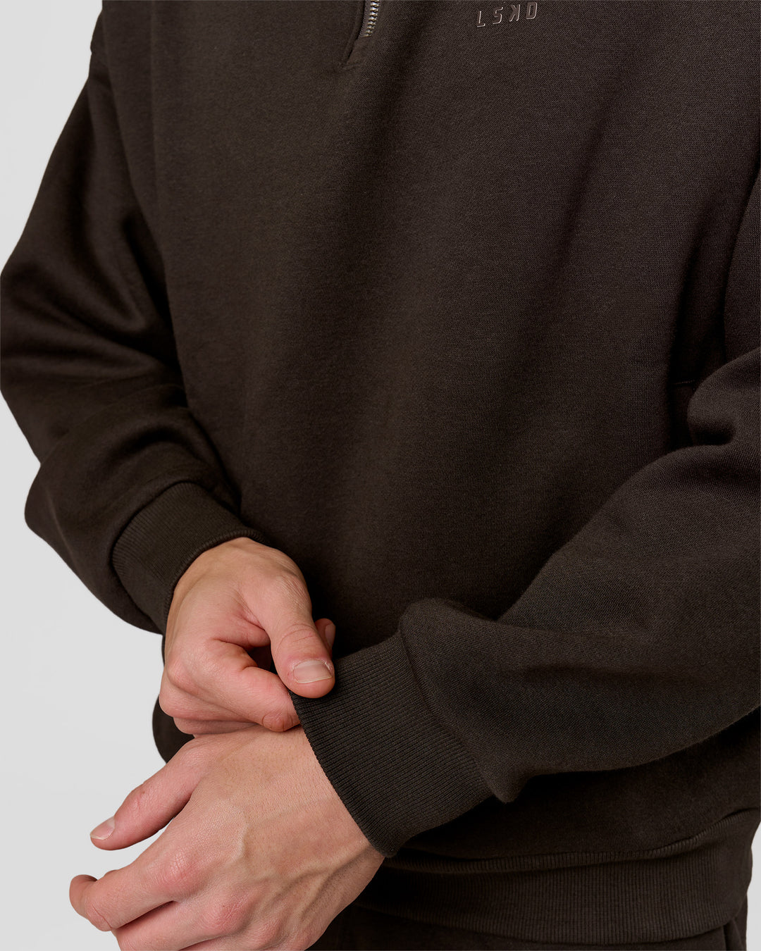 Man wearing Base Quarter Zip Sweater - Ground Coffee | Model:Leandro | Size:M - view 6
