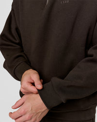 Man wearing Base Quarter Zip Sweater - Ground Coffee | Model:Leandro | Size:M | Thumbnail Index: 5