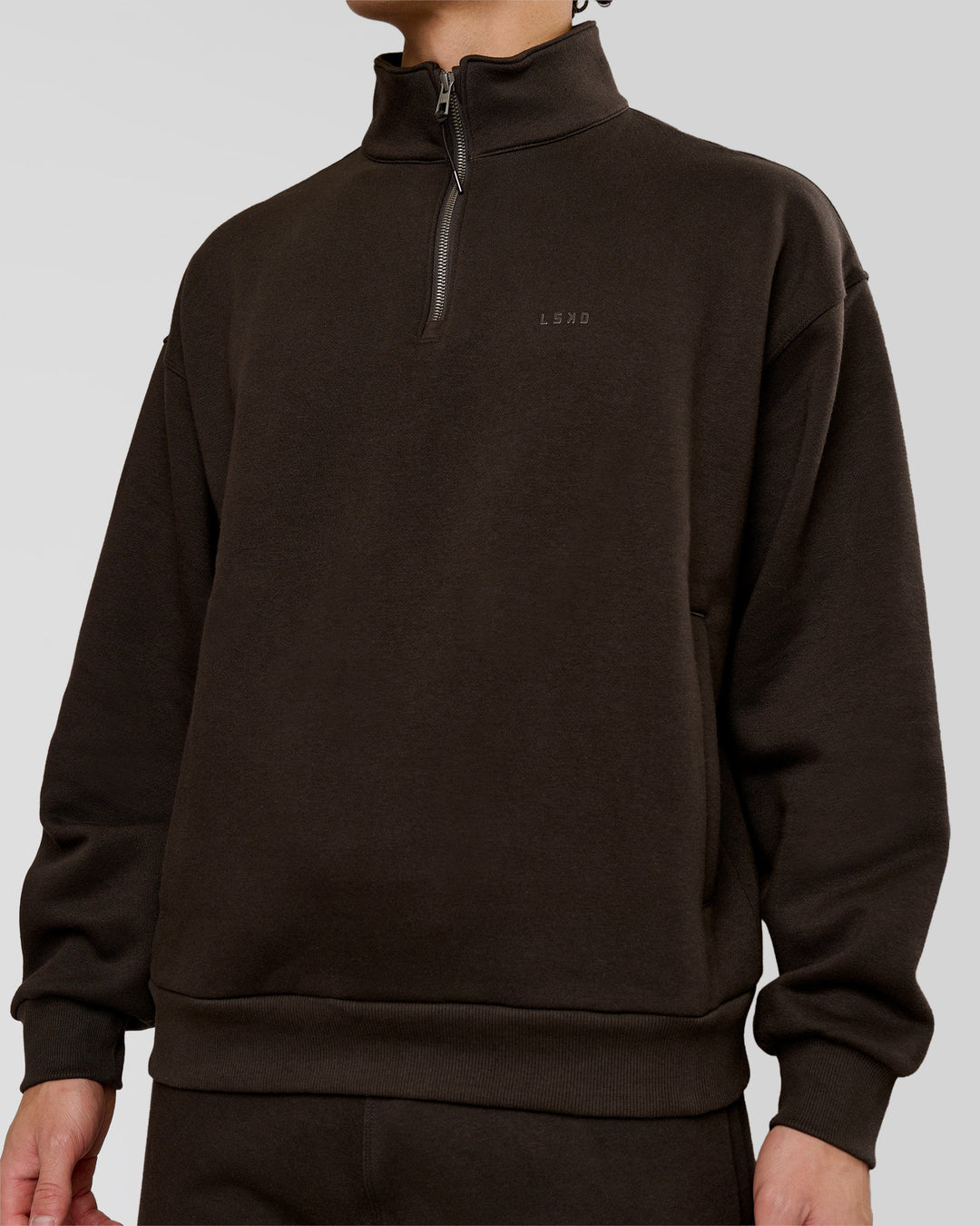Man wearing Base Quarter Zip Sweater - Ground Coffee | Model:Leandro | Size:M - view 7