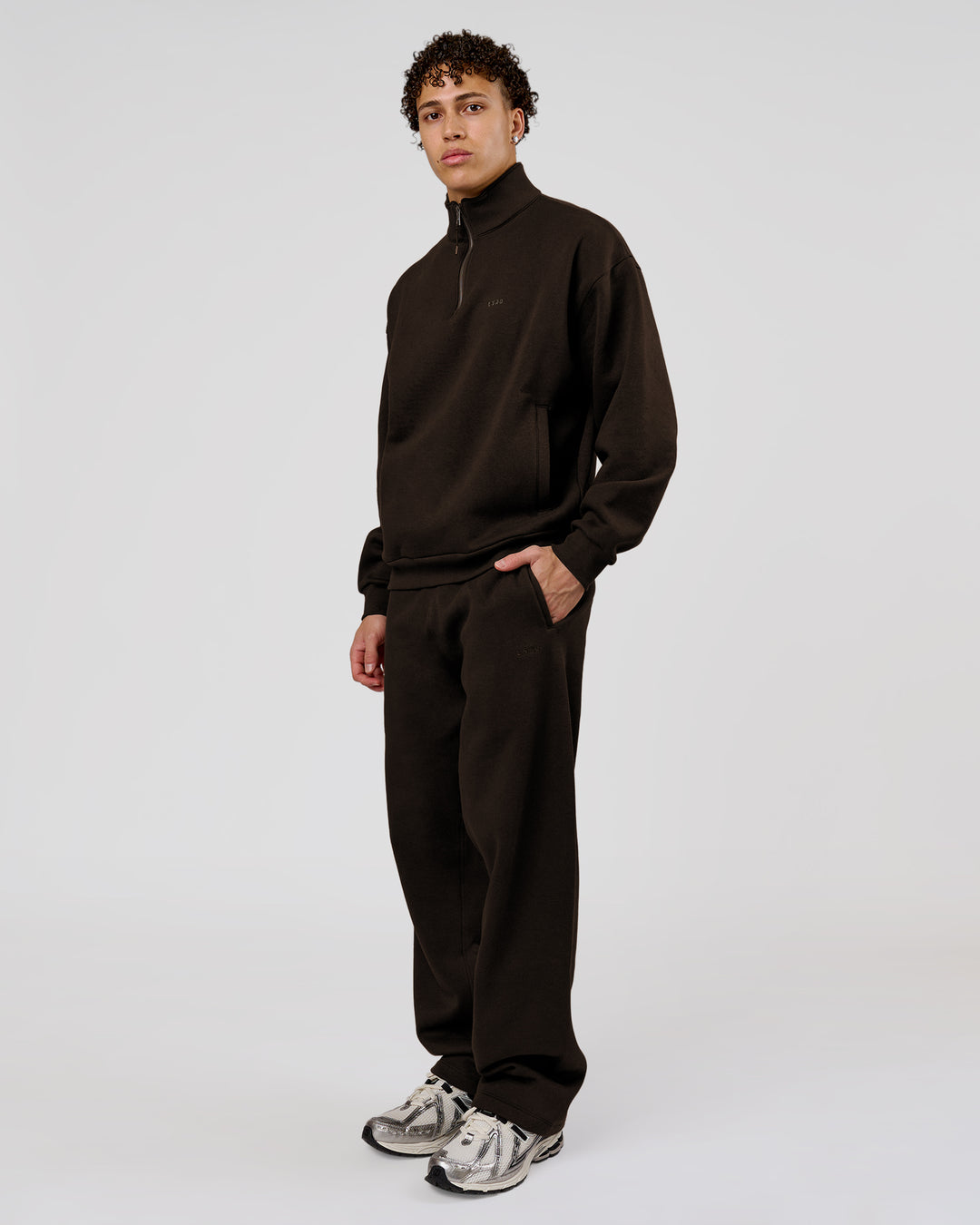 Man wearing Base Quarter Zip Sweater - Ground Coffee | Model:Leandro | Size:M - view 8