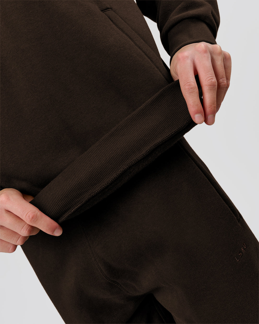 Man wearing Base Quarter Zip Sweater - Ground Coffee | Model:Leandro | Size:M - view 9