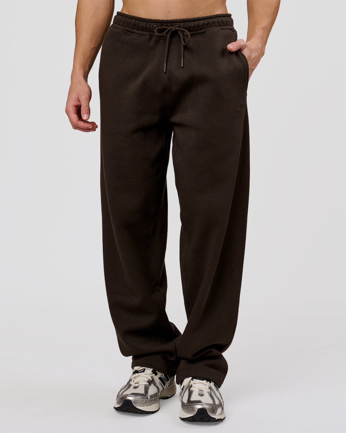 Man wearing Base Wide Leg Track Pant - Ground Coffee | Model:Leandro | Size:M