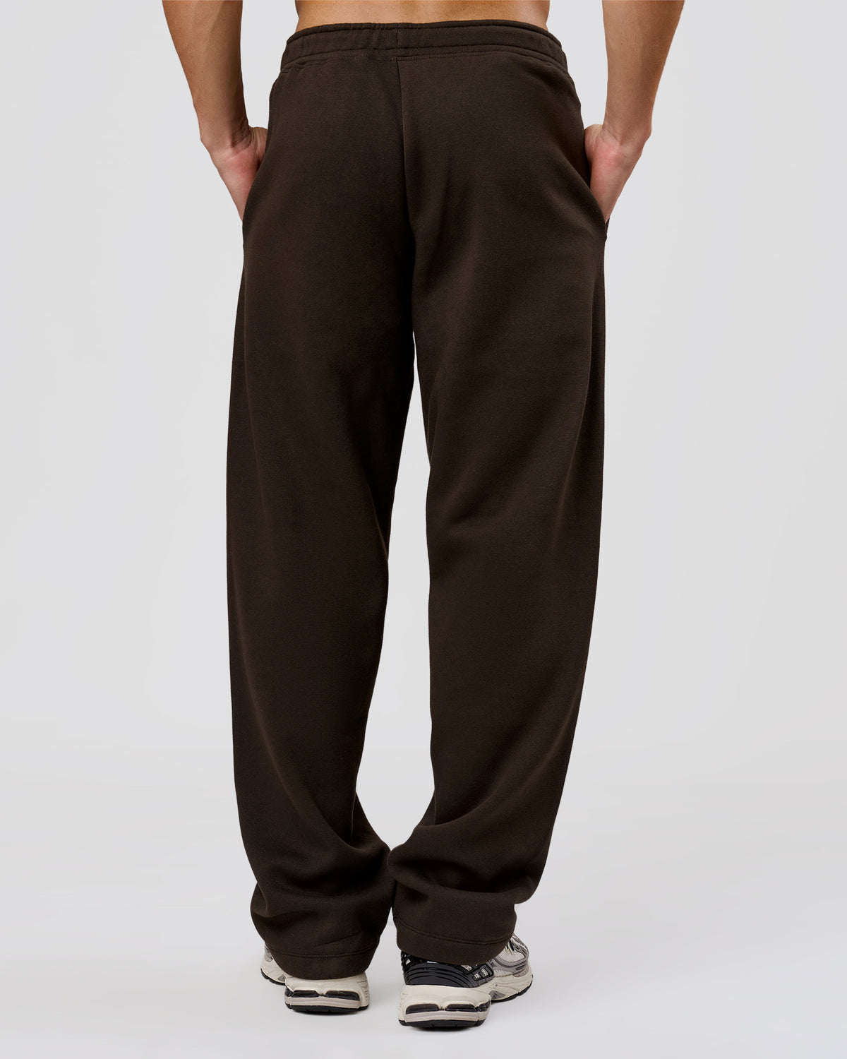 Man wearing Base Wide Leg Track Pant - Ground Coffee | Model:Leandro | Size:M