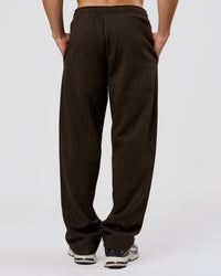 Man wearing Base Wide Leg Track Pant - Ground Coffee | Model:Leandro | Size:M | Thumbnail Index: 1