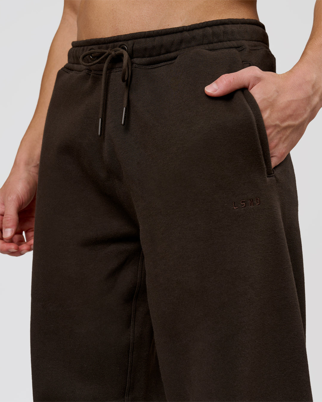 Man wearing Base Wide Leg Track Pant - Ground Coffee | Model:Leandro | Size:M - view 4