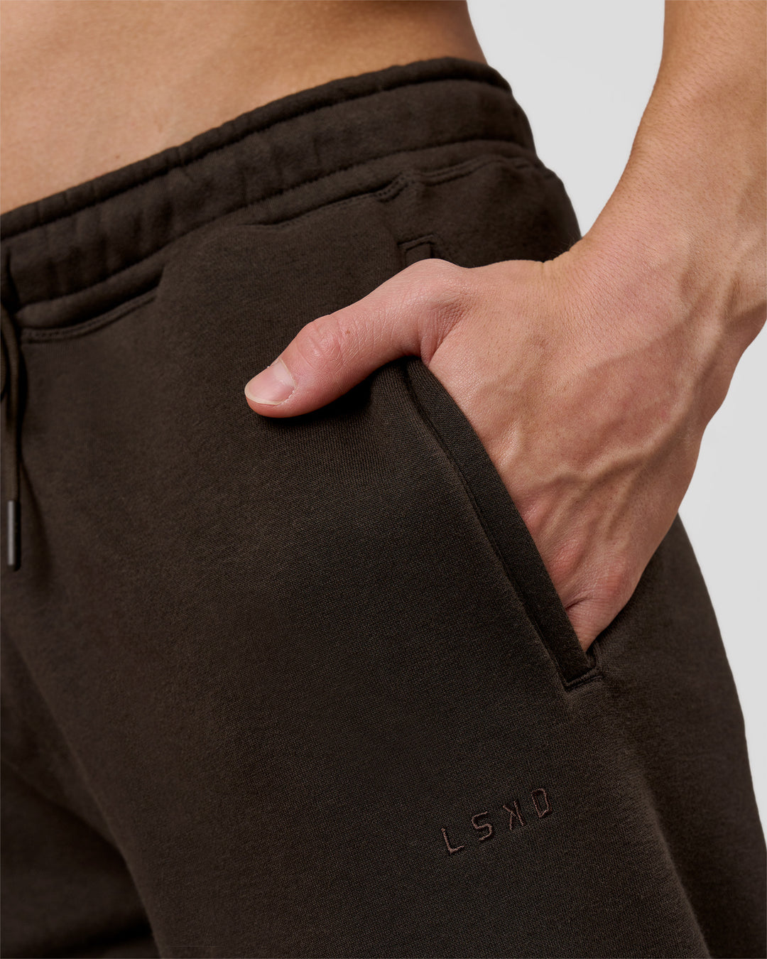 Man wearing Base Wide Leg Track Pant - Ground Coffee | Model:Leandro | Size:M - view 6