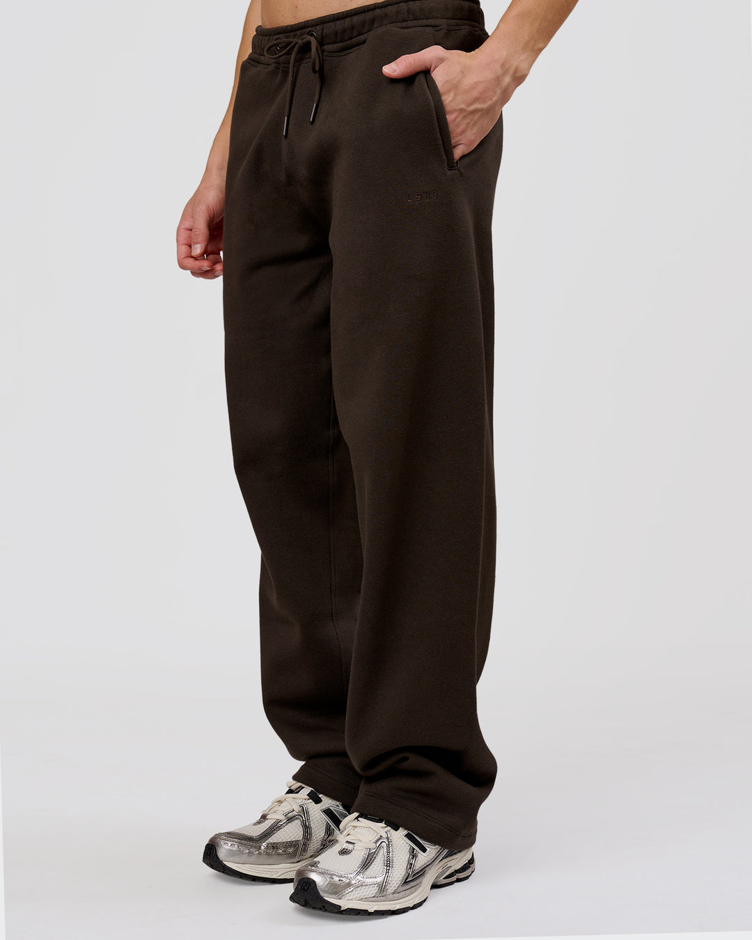 Man wearing Base Wide Leg Track Pant - Ground Coffee | Model:Leandro | Size:M - view 7