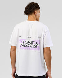 Man wearing Benchmark FLXCotton Oversized Tee - White-Pale Lilac | Model:Leandro | Size:M | Thumbnail Index: 1