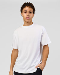 Man wearing Benchmark FLXCotton Oversized Tee - White-Pale Lilac | Model:Leandro | Size:M | Thumbnail Index: 4