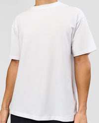 Man wearing Benchmark FLXCotton Oversized Tee - White-Pale Lilac | Model:Leandro | Size:M | Thumbnail Index: 12