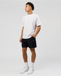 Man wearing Benchmark FLXCotton Oversized Tee - White-Pale Lilac | Model:Leandro | Size:M | Thumbnail Index: 14