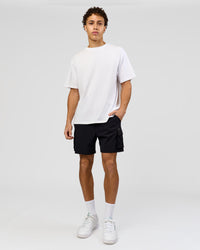 Man wearing Benchmark FLXCotton Oversized Tee - White-Pale Lilac | Model:Leandro | Size:M | Thumbnail Index: 16