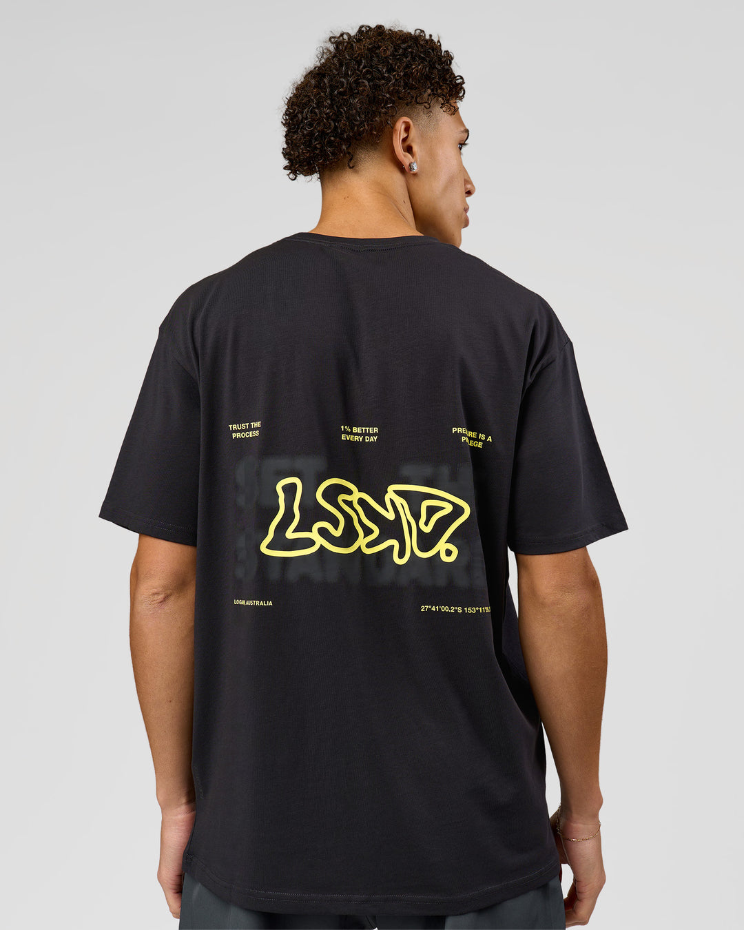 Man wearing Benchmark FLXCotton Oversized Tee - Onyx-Yellow Fizz | Model:Leandro | Size:M - view 7