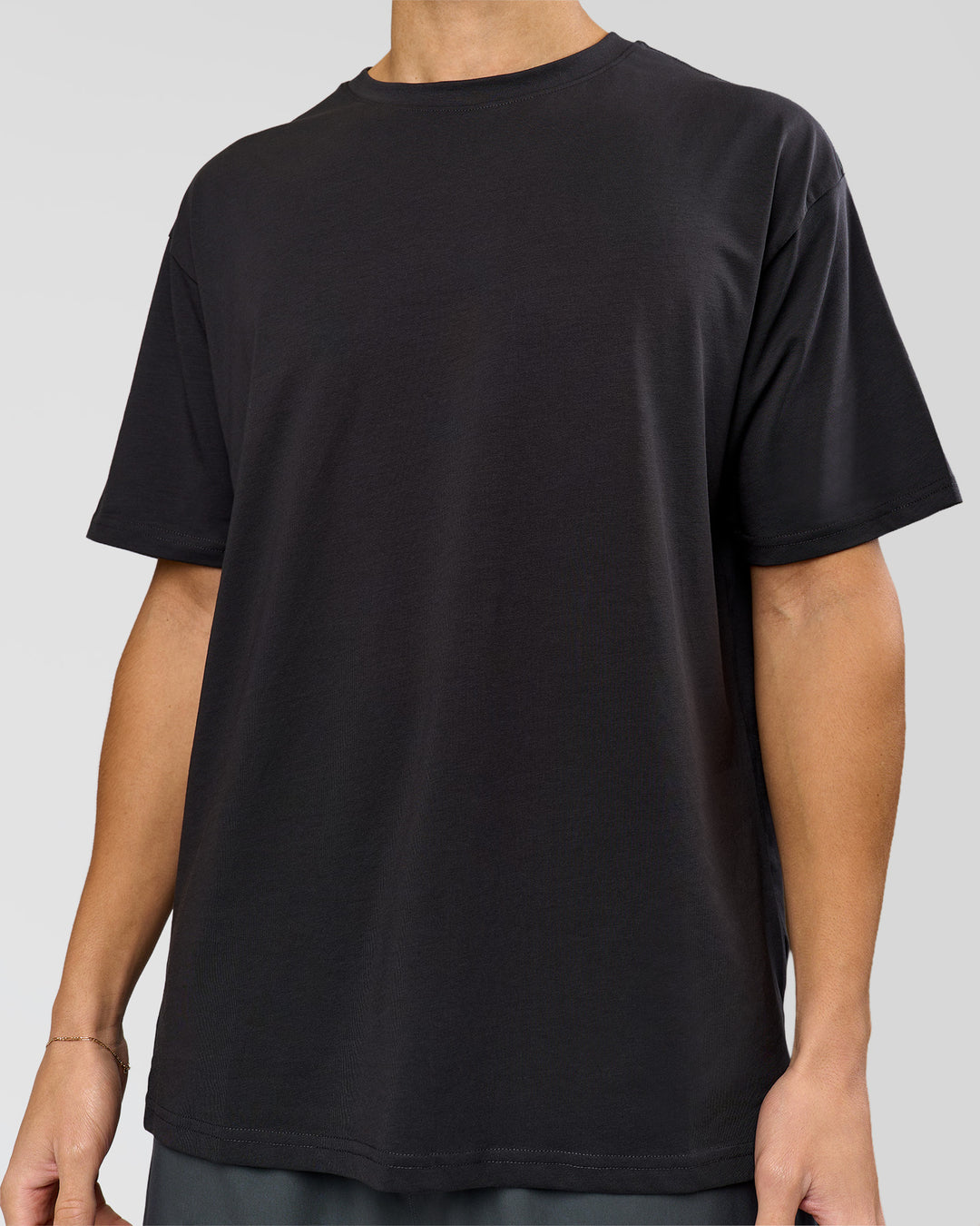 Man wearing Benchmark FLXCotton Oversized Tee - Onyx-Yellow Fizz | Model:Leandro | Size:M - view 13