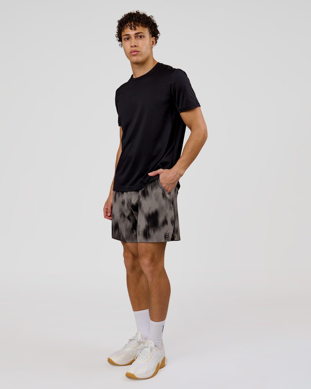 Man wearing Functional Training 7" Short - Bitmap Blur Storm Front | Model:Leandro | Size:M - view 14