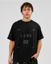 Man wearing Game Plan Heavyweight FLXCotton Oversized Tee - Black | Model:Leandro | Size:M | Thumbnail Index: 1