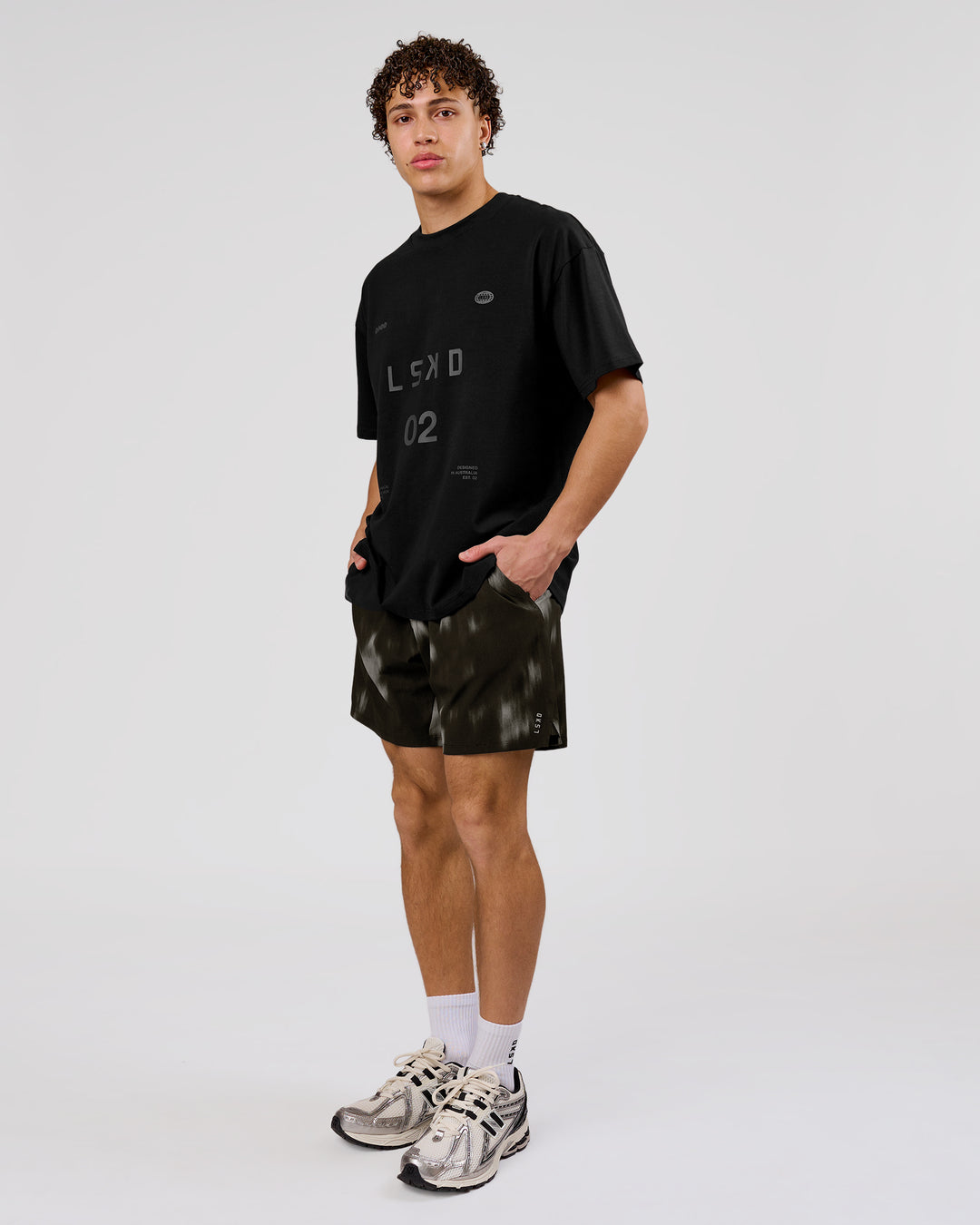 Man wearing Game Plan Heavyweight FLXCotton Oversized Tee - Black | Model:Leandro | Size:M - view 17