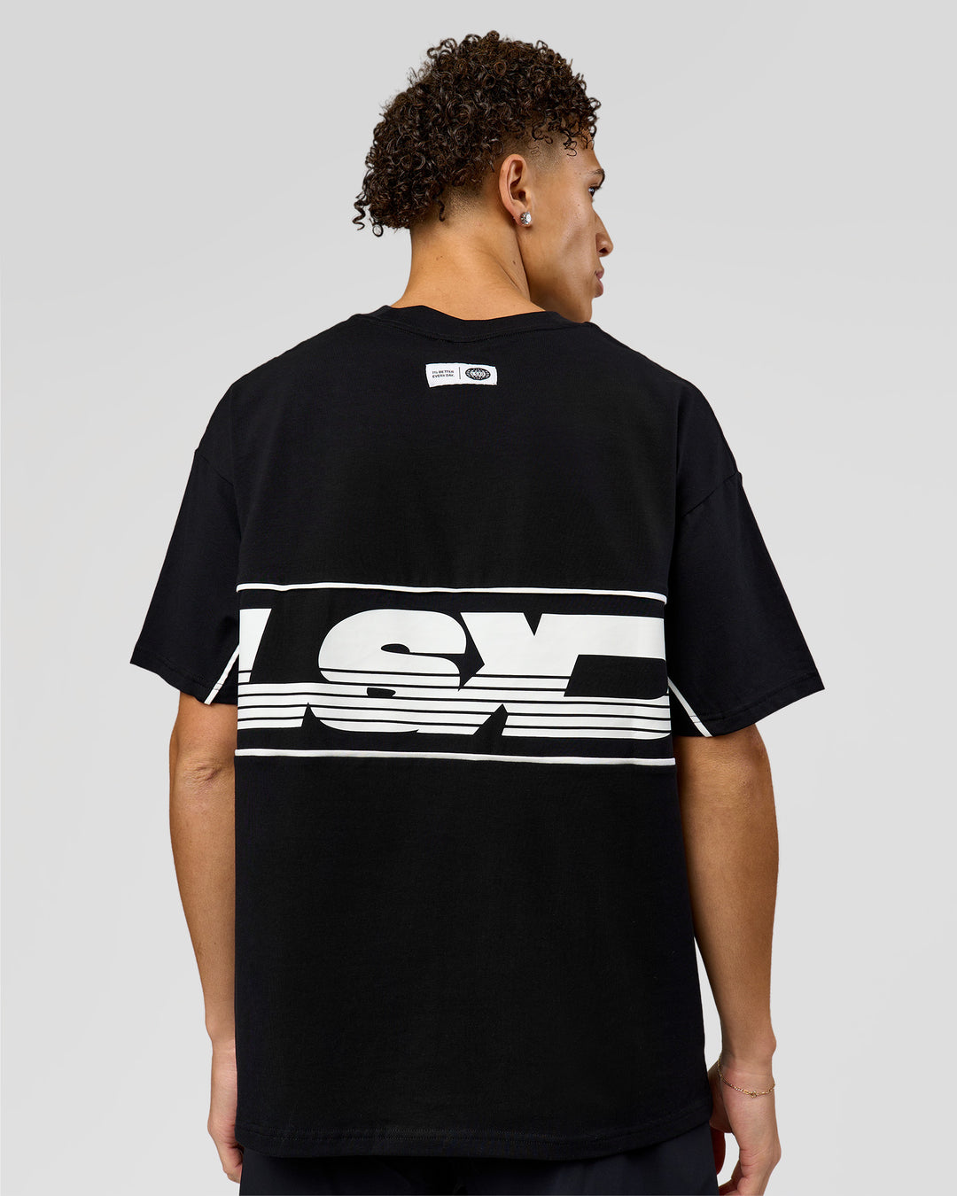 Man wearing Inline Heavyweight FLXCotton Oversized Tee - Black-White | Model:Leandro | Size:M - view 4