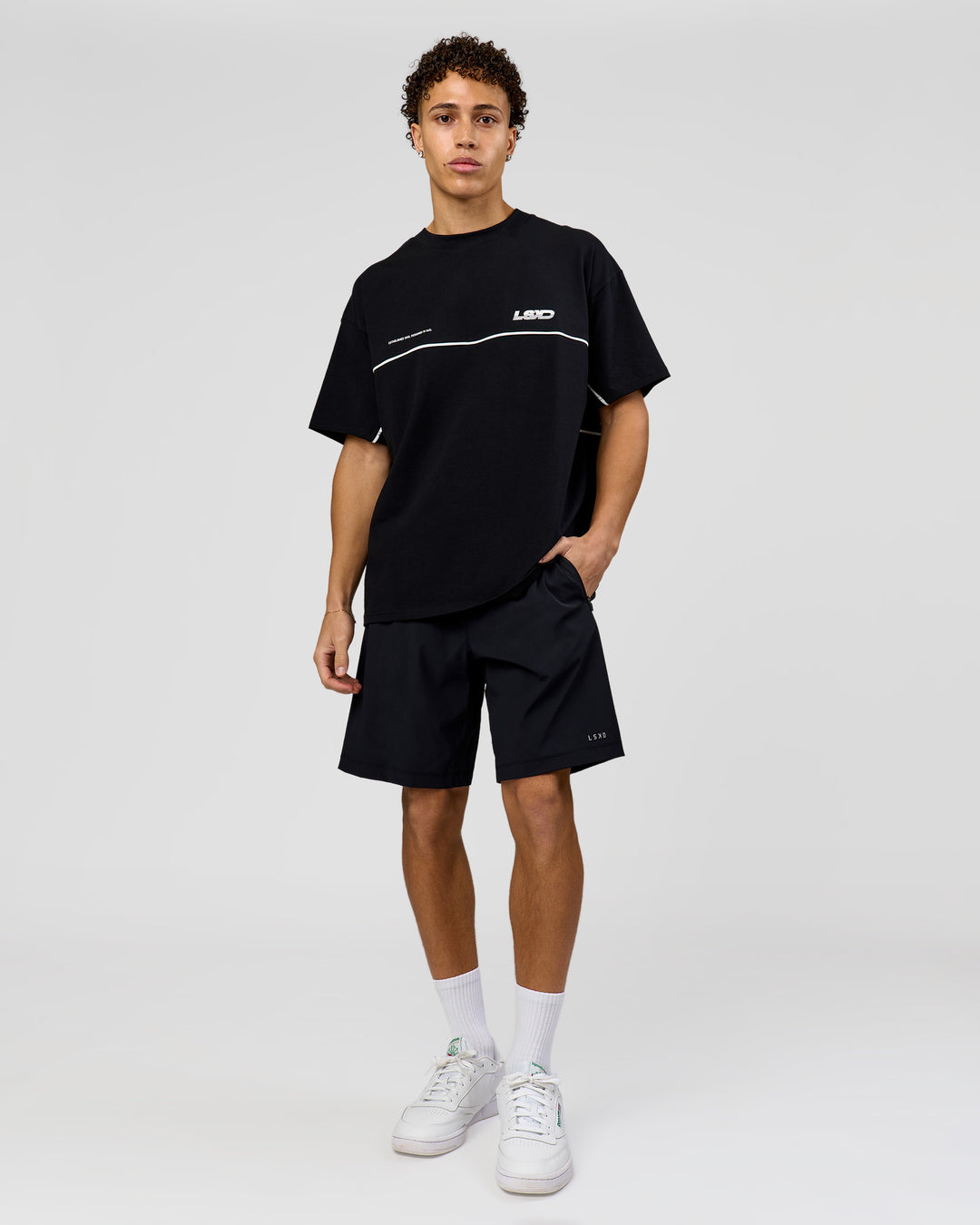 Man wearing Inline Heavyweight FLXCotton Oversized Tee - Black-White | Model:Leandro | Size:M - view 12