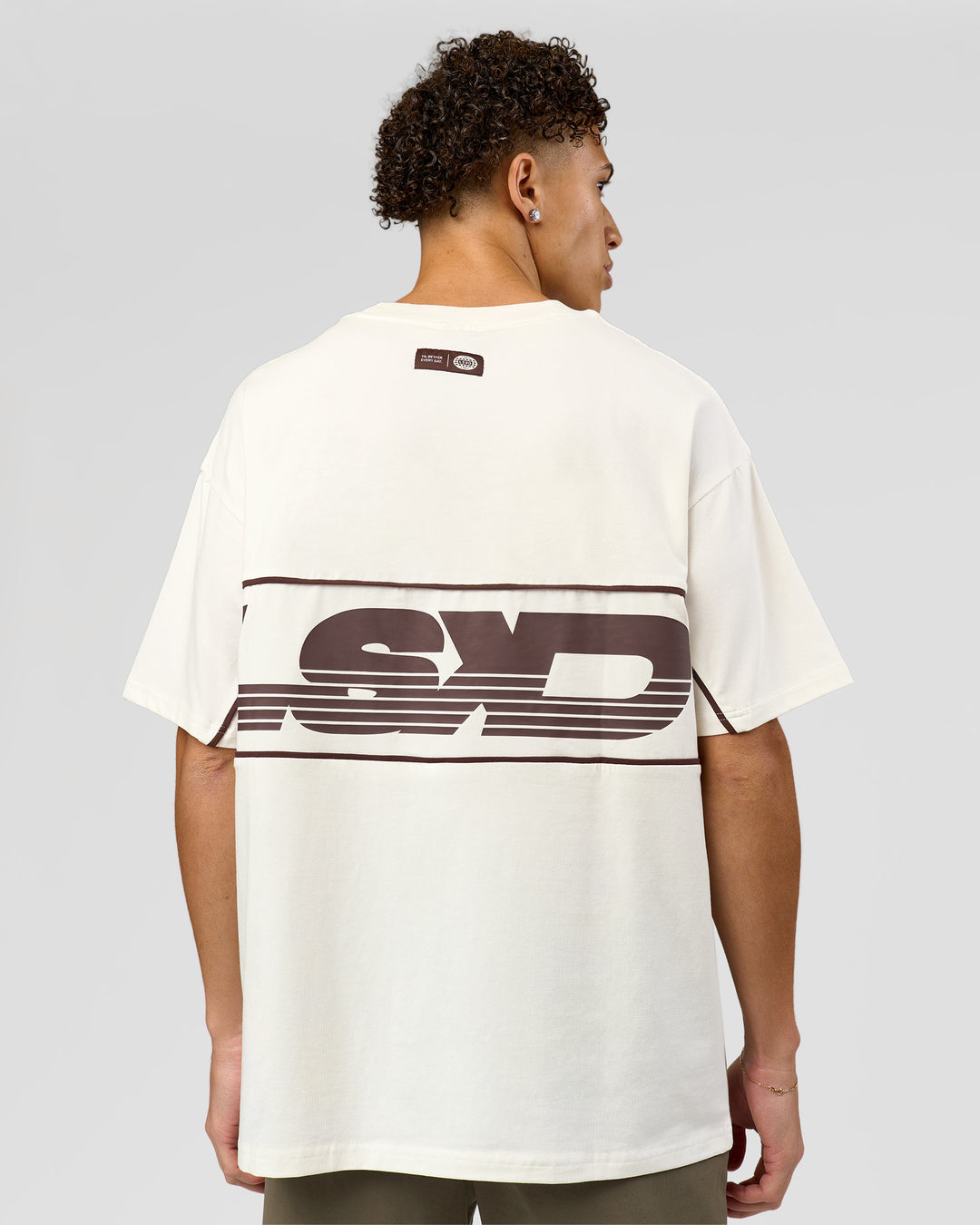 Man wearing Inline Heavyweight FLXCotton Oversized Tee - Off White-Hot Chocolate | Model:Leandro | Size:M - view 4