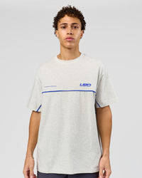 Man wearing Inline Heavyweight FLXCotton Oversized Tee - Silver Marl-Power Cobalt | Model:Leandro | Size:M | Thumbnail Index: 4