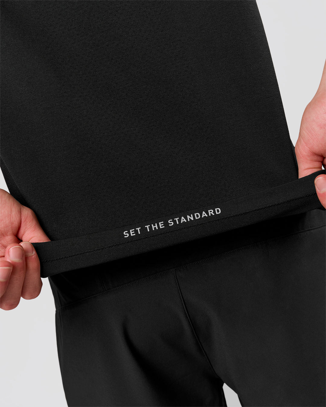 Man wearing Movember x LSKD Drive Seamless Polo - Black | Model:Leandro | Size:M - view 3