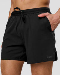 Man wearing Movember x LSKD Pace 5" Lined Running Short - Black | Model:Leandro | Size:M | Thumbnail Index: 1