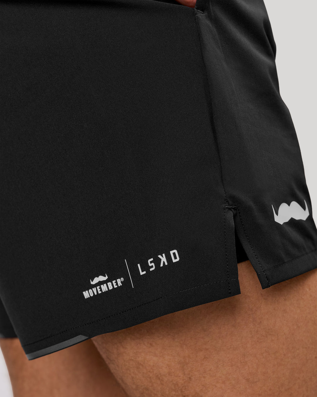 Man wearing Movember x LSKD Pace 5" Lined Running Short - Black | Model:Leandro | Size:M - view 8