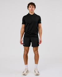Man wearing Movember x LSKD Pace 5" Lined Running Short - Black | Model:Leandro | Size:M | Thumbnail Index: 9