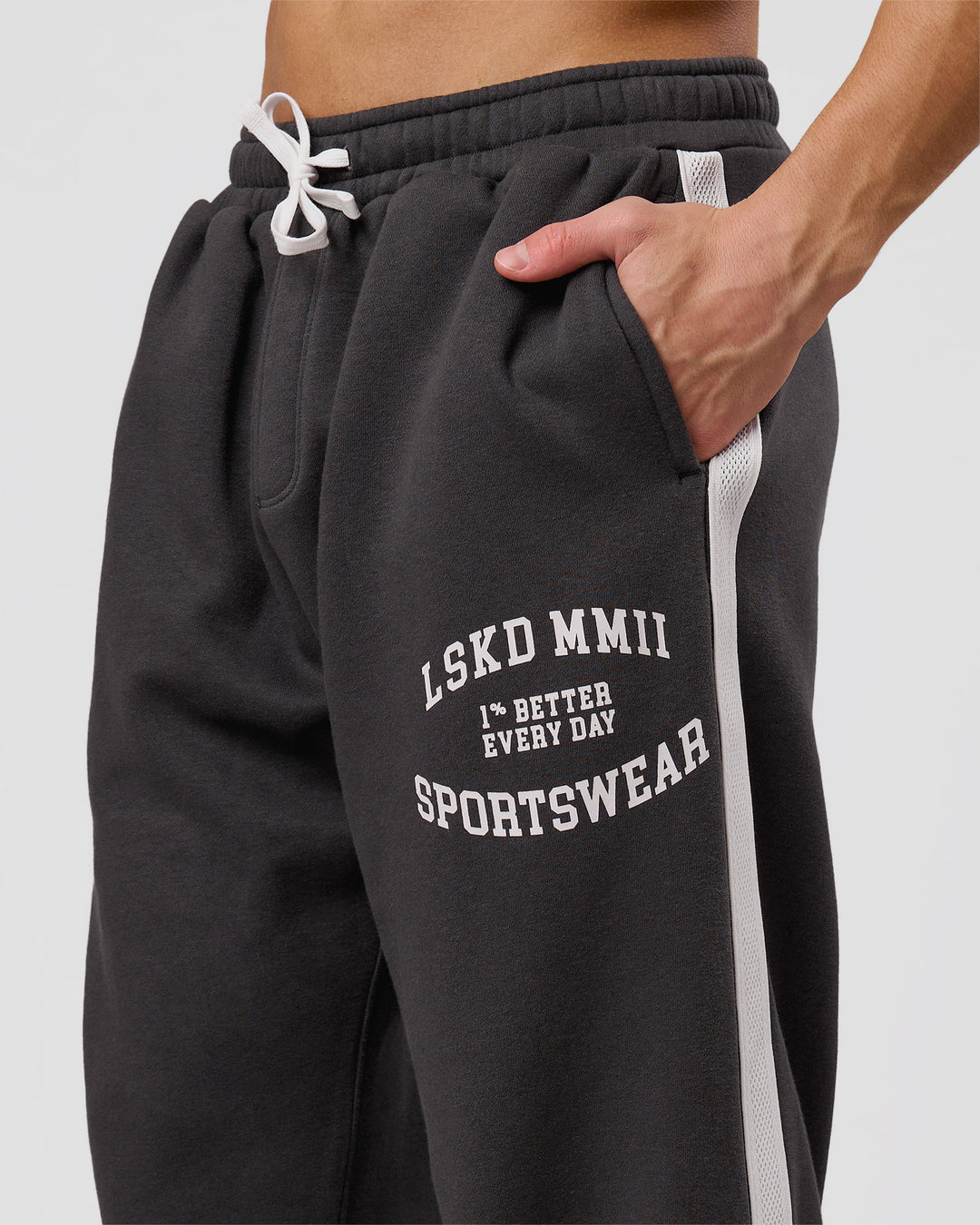 Man wearing Playbook Baggy Cuffed Track Pant - Onyx-Off White | Model:Leandro | Size:M - view 13